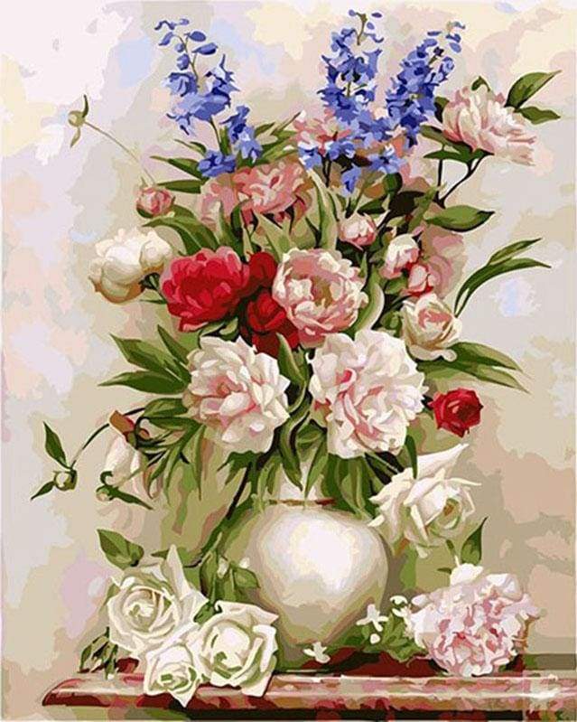 Colorful Flowers in a White Vase